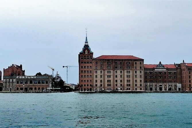 Off the Beaten Path Walk in Venice - Zattere waterfront: the promenade, Molino Stucky, and the water’s workload