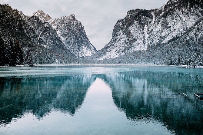 Private Guided Tour in the Dolomites from Venice - Lago di Dobbiaco: forests, the Austrian border, and a wetland detail most people miss