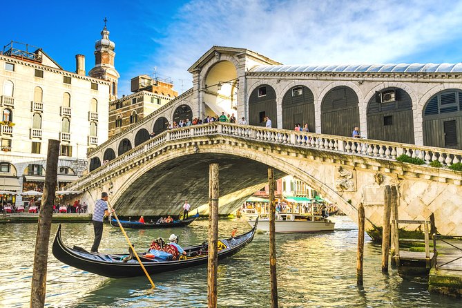 St. Mark’s Basilica Guided Tour with Venice Canals Gondola Ride - Gondola ride route: Grand Canal, bridges, palaces, and stories
