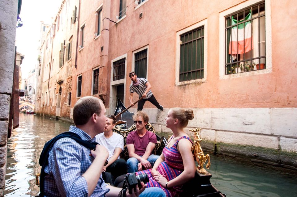 Venetian Private Sandolo tour - The canal scenery: palaces, bridges, and that water-level Venice view
