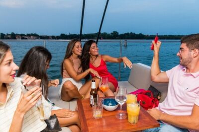 Venice by Night Catamaran Cruise - Live sax and bar toast: the onboard mood that makes it worth it