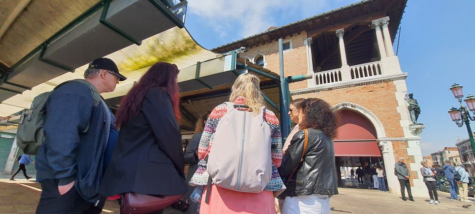Venice: City Wonders Group Walking Tour with a Local Expert - Rialto Bridge and the Grand Canal crossing: the big Venice moment in motion