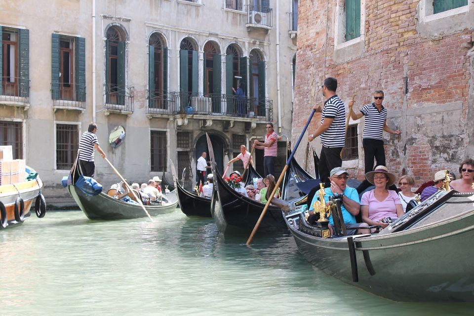 Venice: Grand Canal by Gondola with Live Commentary - Getting on the water: Teatro La Fenice and the canal turns