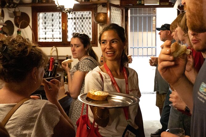 Venice Like a Local: Food, Wine & Spritz Tour with Traghetto Ride - Crossing the Grand Canal by traghetto: the local way to do it