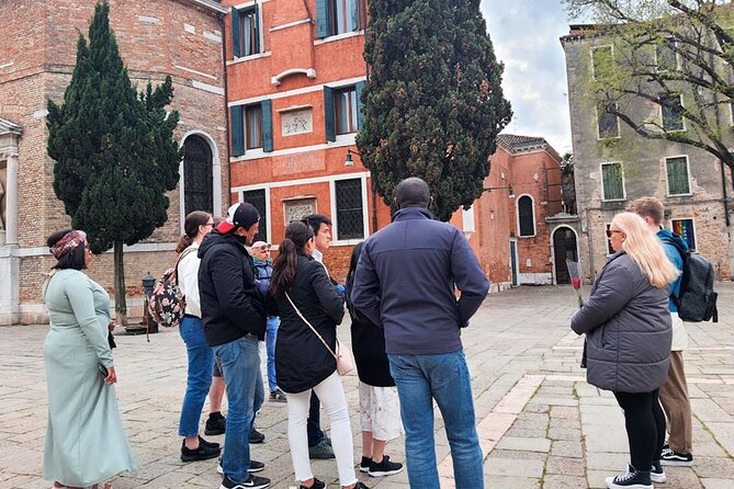 Venice Sightseeing Small Group Walking Tour with a Local Guide - Scuola Grande di San Rocco: A Stop That Explains Venetian Power