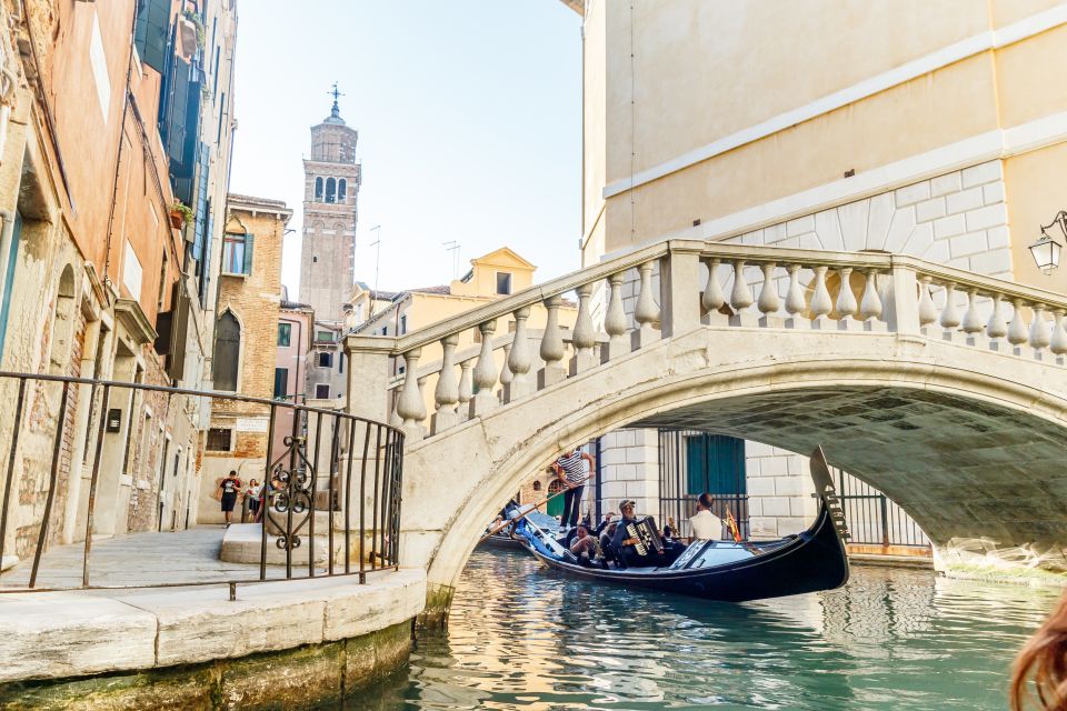 Venice: Traditional Shared Gondola Ride - The Gondolier: Steering Focus, Not a Script